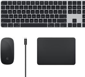 Tampilan atas aksesori Mac: Magic Keyboard, Magic Mouse, Magic Trackpad, dan kabel Thunderbolt.